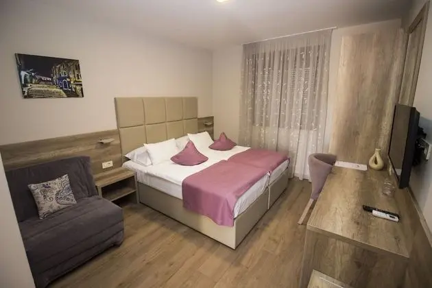 Deluxe Tek Büyük veya İki Ayrı Yataklı Oda