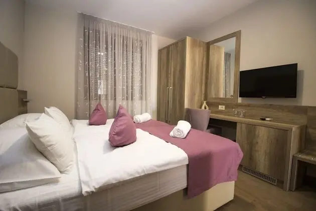 Deluxe Tek Büyük veya İki Ayrı Yataklı Oda