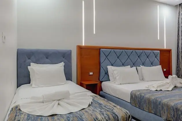 Üç Kişilik Oda