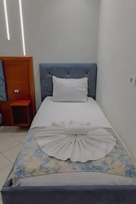 Üç Kişilik Oda