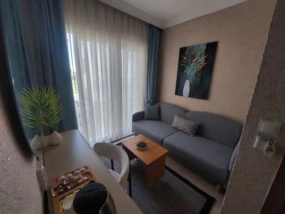 Fransız Balkonlu Comfort Oda Oturma Alanlı