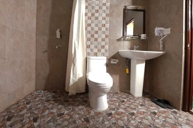 Deluxe Tek Büyük veya İki Ayrı Yataklı Oda