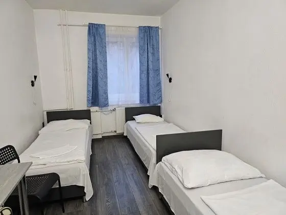 Üç Kişilik Oda