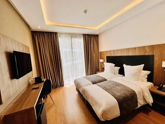 Deluxe Tek Büyük veya İki Ayrı Yataklı Oda