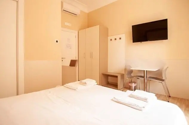 Classic Tek Büyük veya İki Ayrı Yataklı Oda