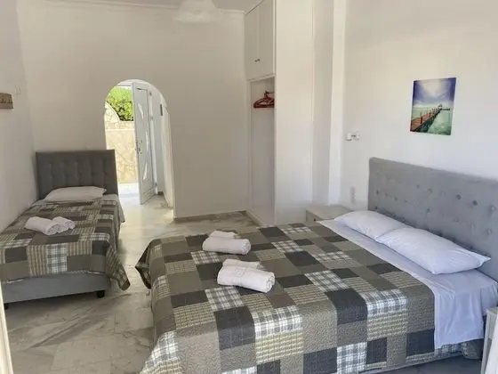 Üç Kişilik Oda