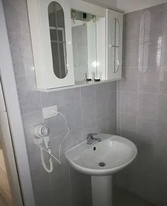 Üç Kişilik Oda