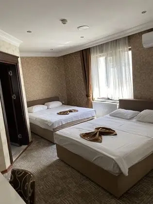 Standard Dört Kişilik Oda, 1 Yatak Odası, Banyolu/Duşlu, Şehir Manzaralı