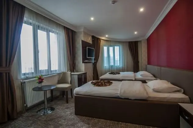 Üç Kişilik Oda