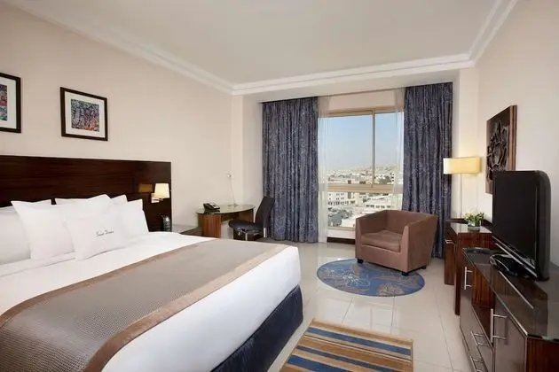 King Deluxe Corner Room with City View