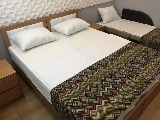 Economy Tek Büyük veya İki Ayrı Yataklı Oda
