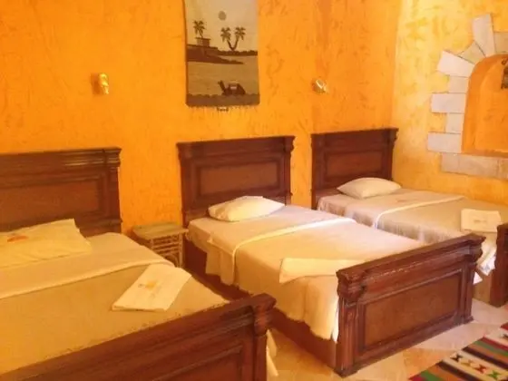 Deluxe Üç Kişilik Oda, Bahçe Manzaralı