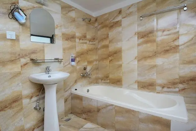 Deluxe Tek Büyük veya İki Ayrı Yataklı Oda