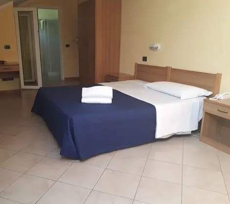 Basic Tek Büyük veya İki Ayrı Yataklı Oda