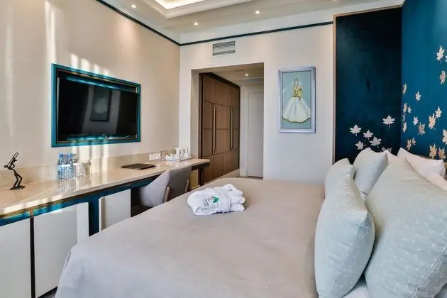 Basic Tek Büyük veya İki Ayrı Yataklı Oda