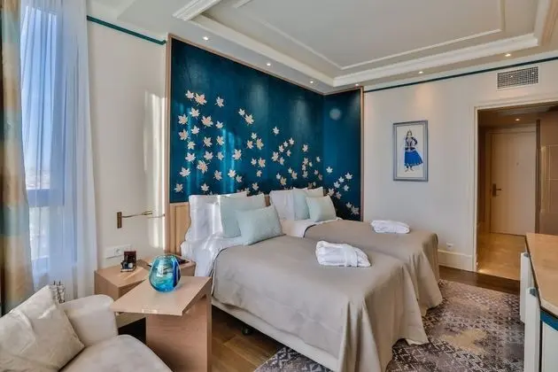 Basic Tek Büyük veya İki Ayrı Yataklı Oda