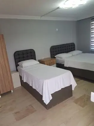 Üç Kişilik Oda, Bahçe Manzaralı