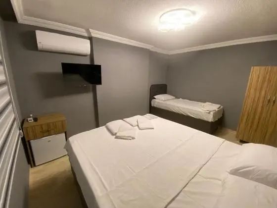 Üç Kişilik Oda, Bahçe Manzaralı