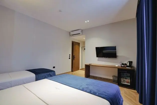 Üç Kişilik Oda, Birden Çok Yatak, Bahçe Manzaralı