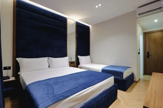 Üç Kişilik Oda, Birden Çok Yatak, Bahçe Manzaralı