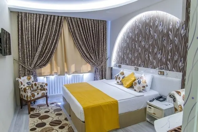 Deluxe Tek Büyük veya İki Ayrı Yataklı Oda