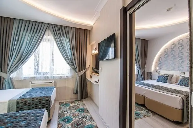 Deluxe Tek Büyük veya İki Ayrı Yataklı Oda