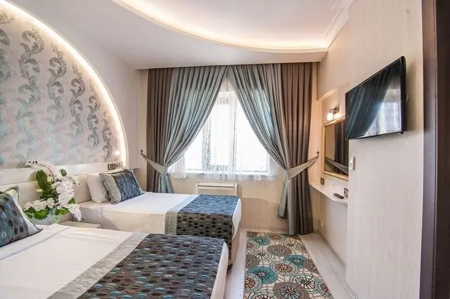 Deluxe Tek Büyük veya İki Ayrı Yataklı Oda