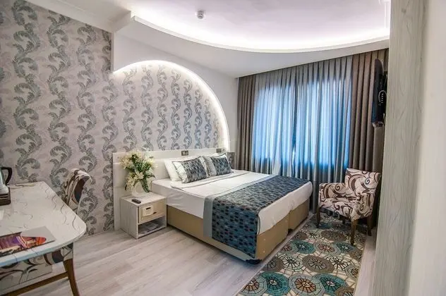 Deluxe Tek Büyük veya İki Ayrı Yataklı Oda