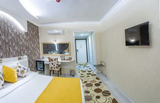 Deluxe Tek Büyük veya İki Ayrı Yataklı Oda