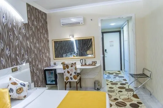 Deluxe Tek Büyük veya İki Ayrı Yataklı Oda
