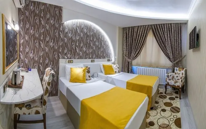 Deluxe Tek Büyük veya İki Ayrı Yataklı Oda
