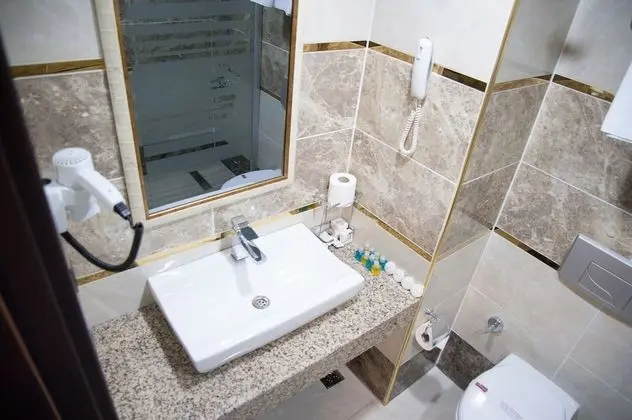 Deluxe Tek Büyük veya İki Ayrı Yataklı Oda