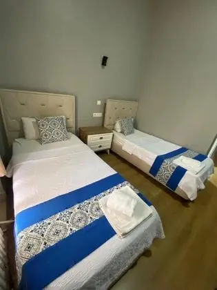 Deluxe İki Tek Yataklı Oda