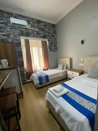Deluxe İki Tek Yataklı Oda