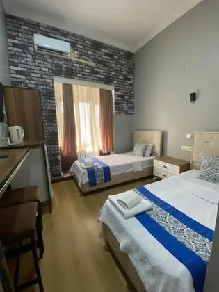 Deluxe İki Tek Yataklı Oda