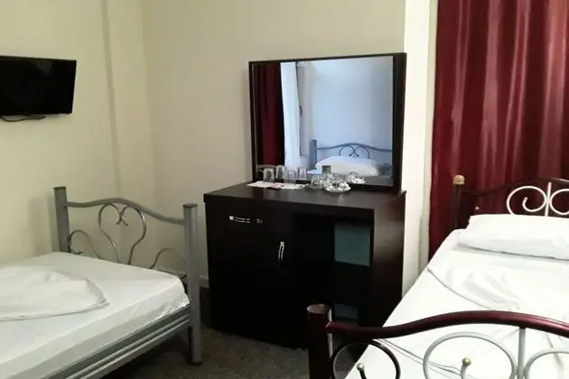 2 Tek Yataklı Oda