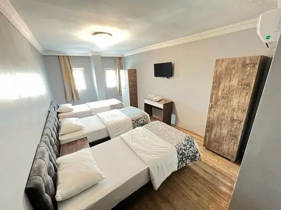 Üç Kişilik Oda