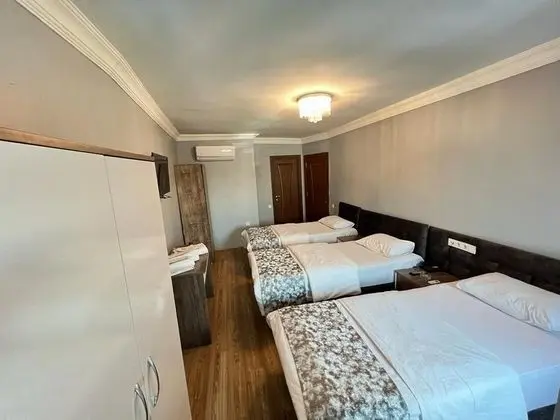 Üç Kişilik Oda