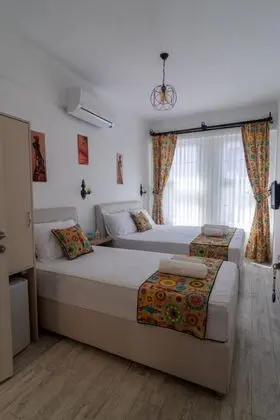 Standart Üç Kişilik Oda, Bahçe Manzaralı