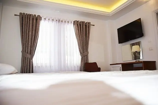 Deluxe Üç Kişilik Oda