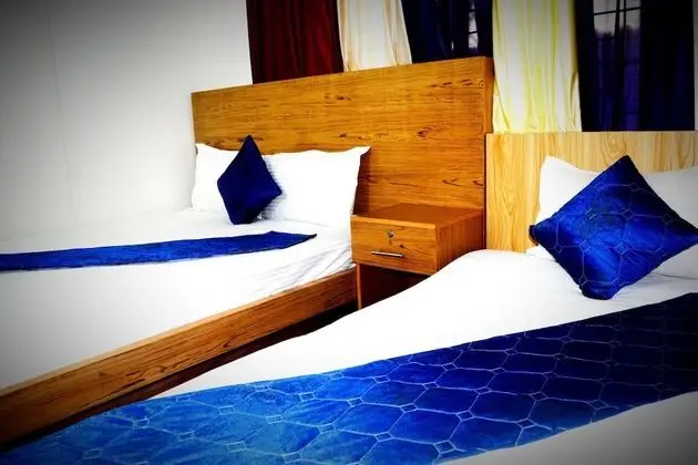 Deluxe Tek Büyük veya İki Ayrı Yataklı Oda