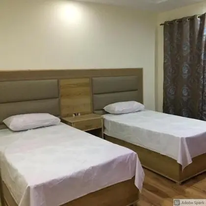 Deluxe Tek Büyük veya İki Ayrı Yataklı Oda