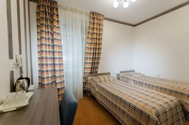 Tek Büyük veya İki Ayrı Yataklı Oda, Bahçe Manzaralı