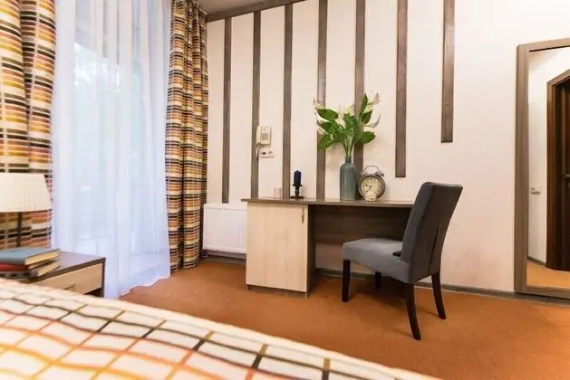 Tek Büyük veya İki Ayrı Yataklı Oda, Bahçe Manzaralı