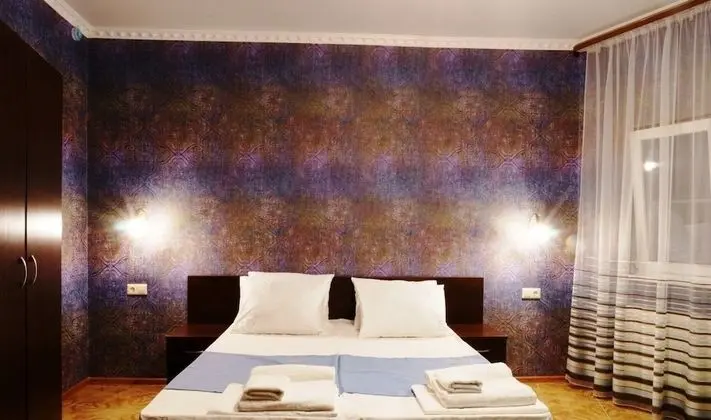 Deluxe Tek Büyük veya İki Ayrı Yataklı Oda, Balkon, Havuz Manzaralı