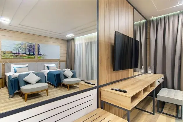 Deluxe Tek Büyük veya İki Ayrı Yataklı Oda