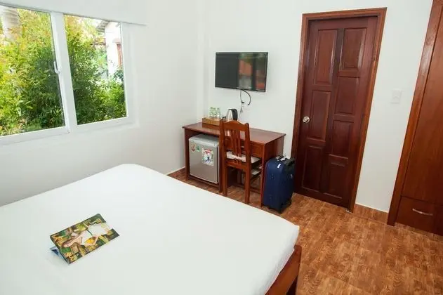 Deluxe Tek Büyük veya İki Ayrı Yataklı Oda (Bungalow)