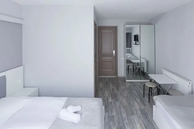 Üç Kişilik Oda