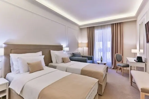 Deluxe Tek Büyük veya İki Ayrı Yataklı Oda