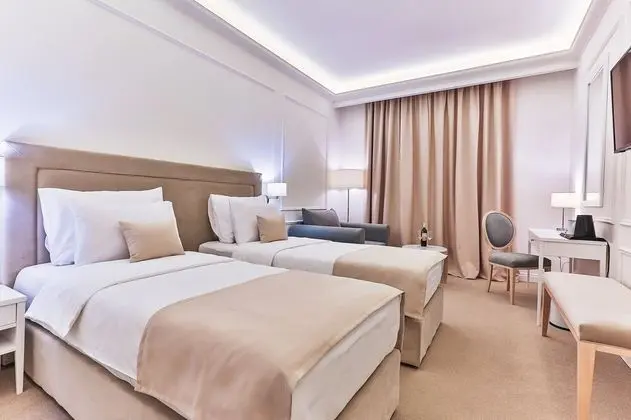 Deluxe Tek Büyük veya İki Ayrı Yataklı Oda